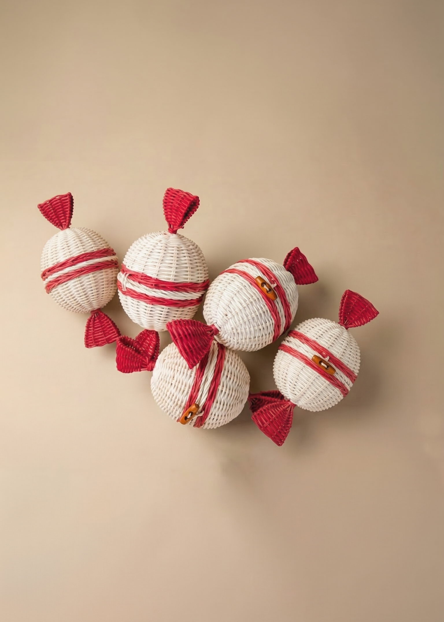 Rattan candy parcels  on a beige background